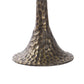 Hammered bronze door knocker on a white background