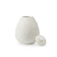  Blanc de chine ribbed patterned egg shaped white vase with a lid on a white background