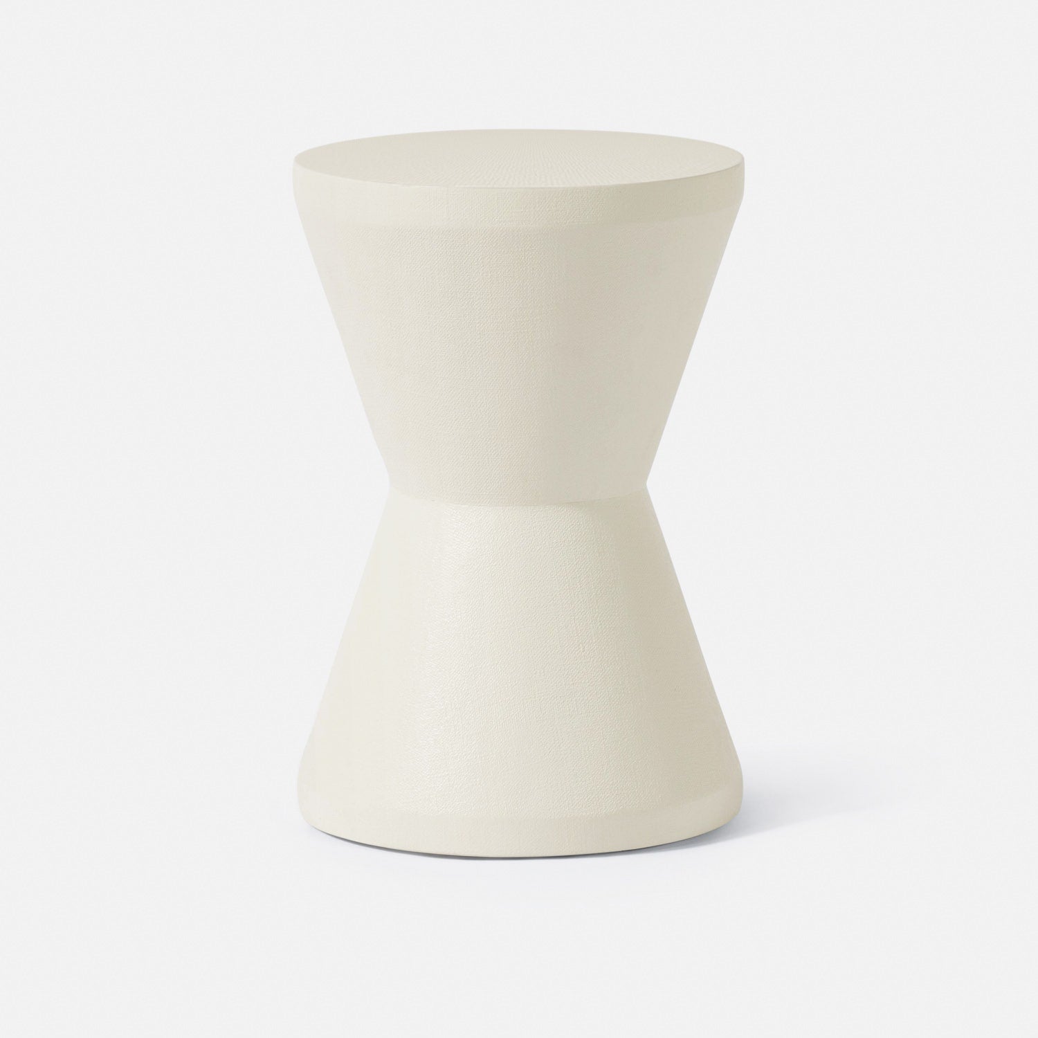 White ceramic stool on a white background
