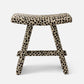 Small stool with leopard print pattern on a white background