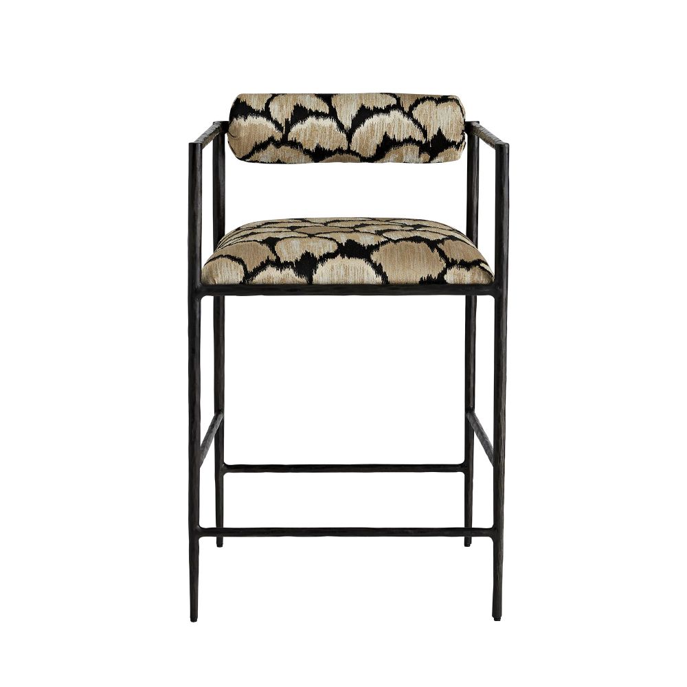 Bar stool with patterned cushion on a white background