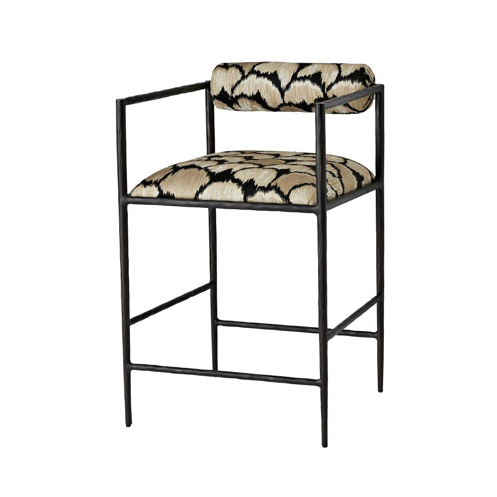 Bar stool with patterned cushion and black metal frame on a white background