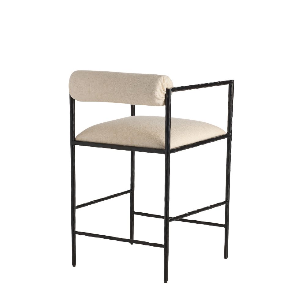 Bar stool with beige cushioned seat and backrest on a white background