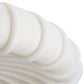 Close-up of a white, wavy surface texture