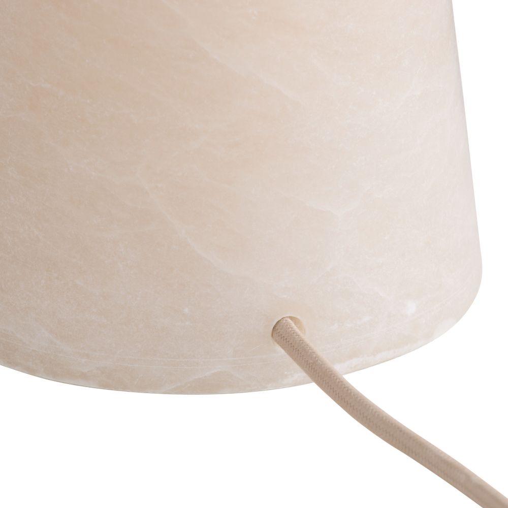 Close-up of a beige lampshade with a white background
