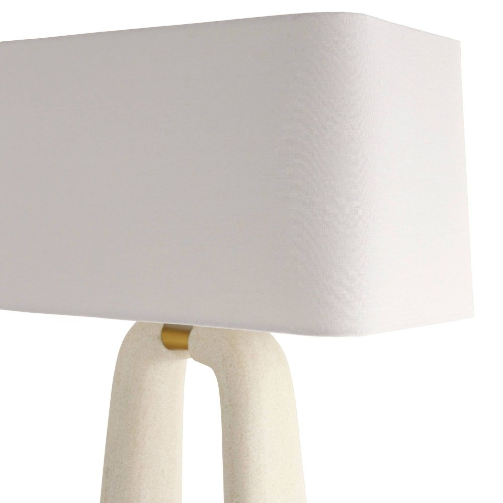 White lamp with a beige base on a white background