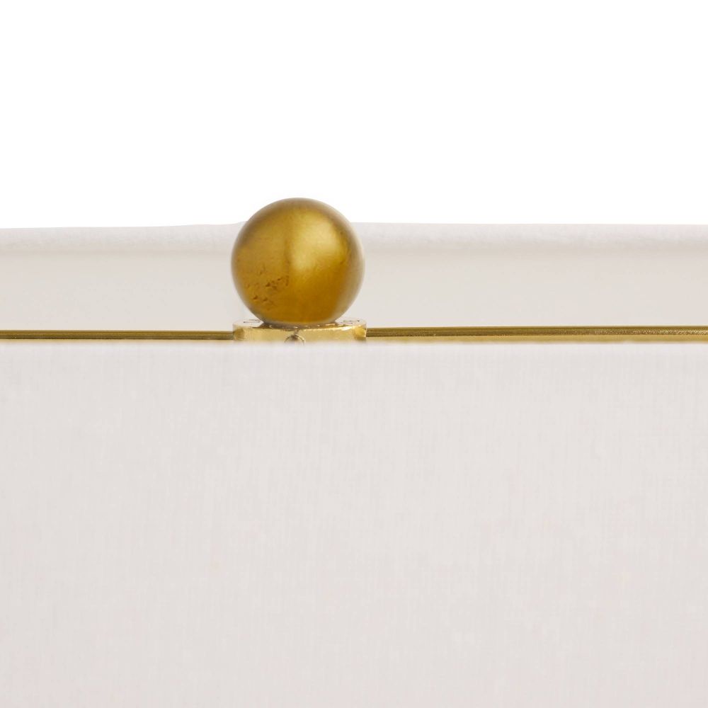 Decorative item with a gold sphere on a white background
