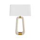 Table lamp with a white shade and gold base on a white background