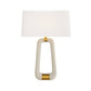 Table lamp with white shade and gold accents on a white background