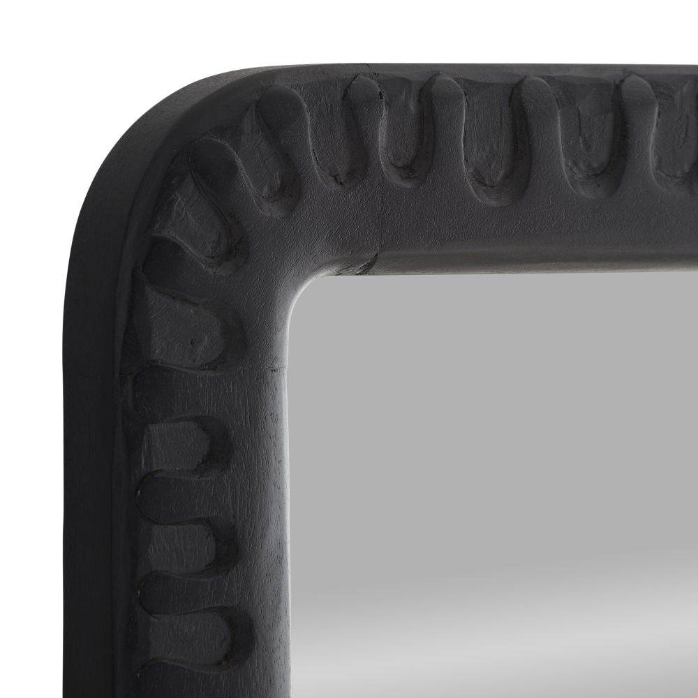 Black framed mirror with textured border on a white background