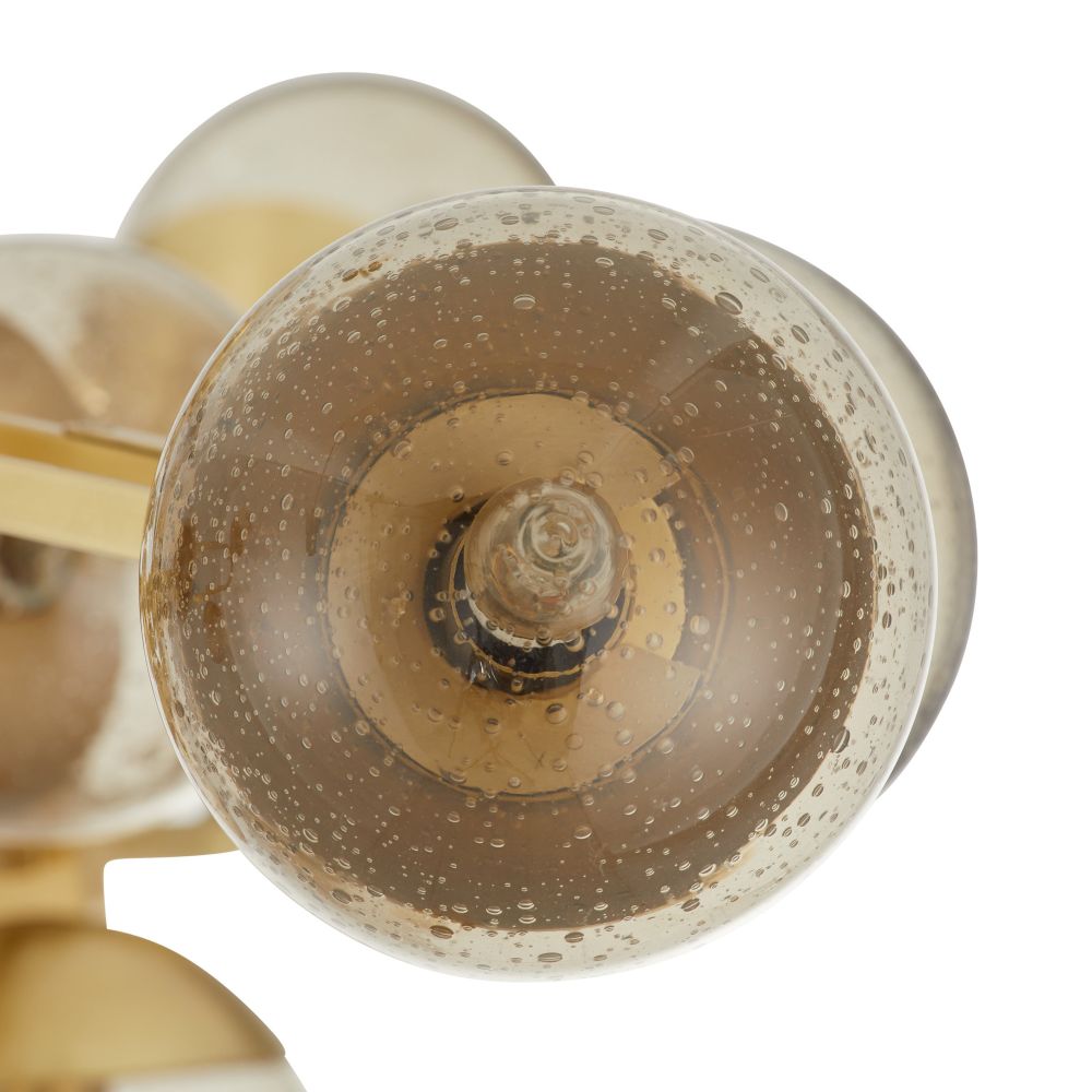 Close-up of a glass knob with a textured surface on a white background