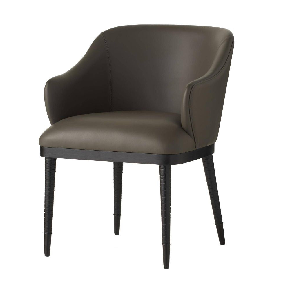 Gray leather armchair with black legs on a white background