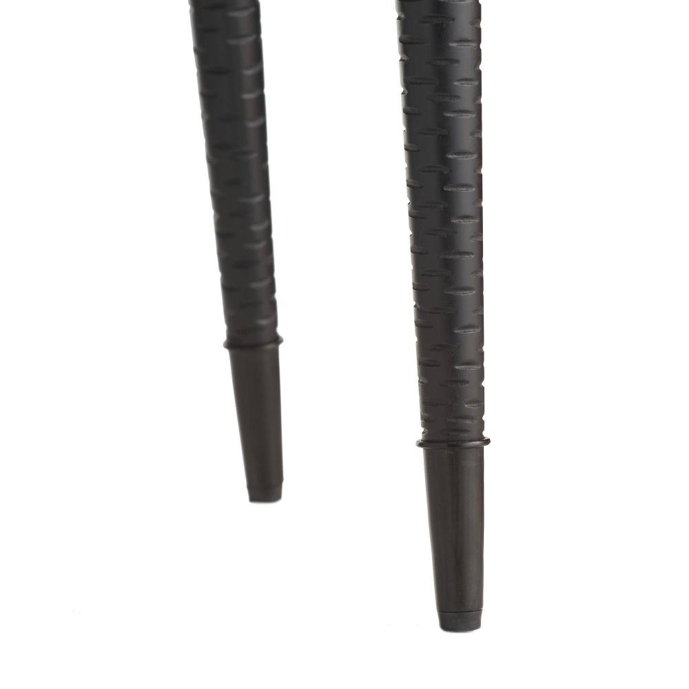 Gray leather armchair with black legs on a white background