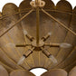 Bronze chandelier with six light bulbs against a textured brown background