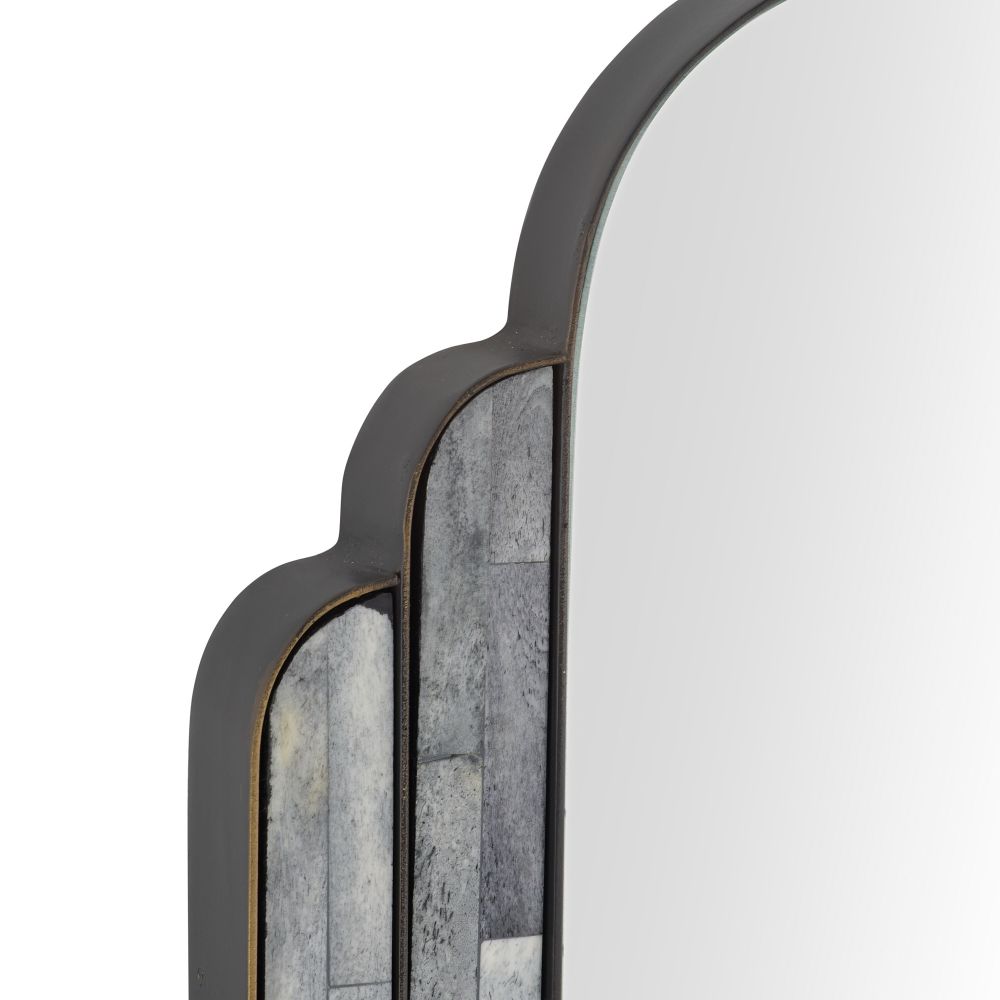 Decorative wall mirror with scalloped edge and textured frame on a white background