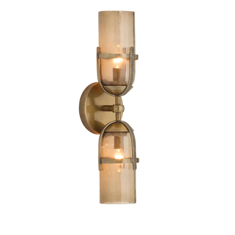 Wall-mounted light fixture with gold finish and amber glass on a white background