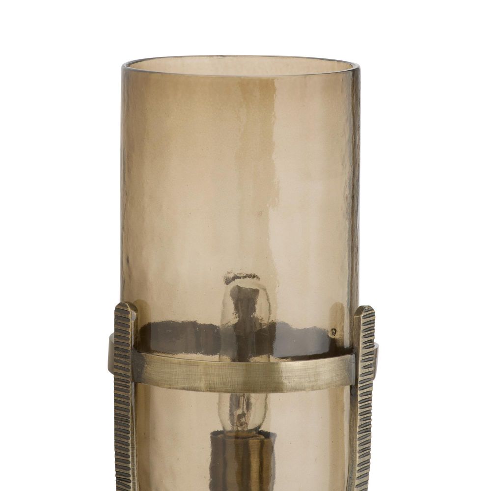Vintage-style lamp with smoked glass shade and metallic base on a white background