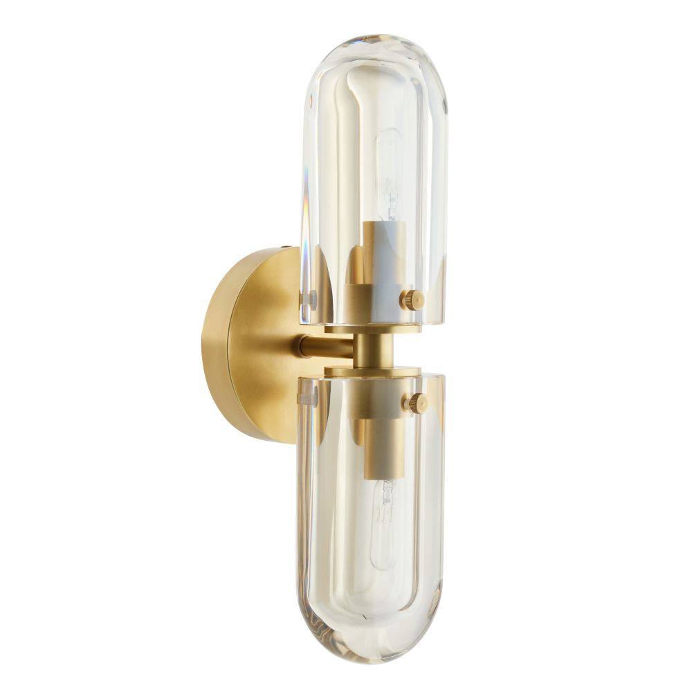 Gold wall sconce with clear glass on a white background