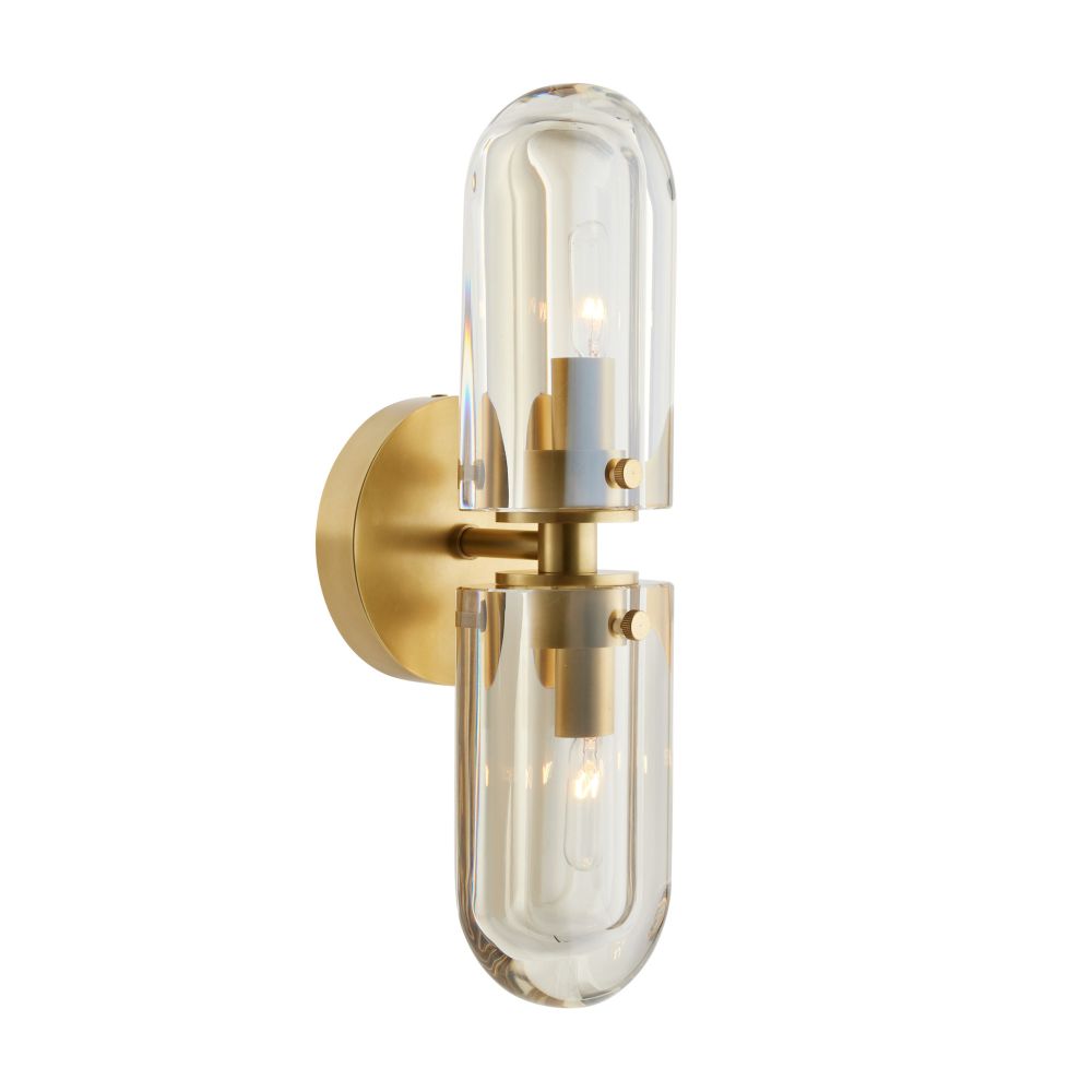 Gold wall sconce with clear glass on a white background