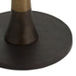 Close-up of a black round base with a gold accent on a white background