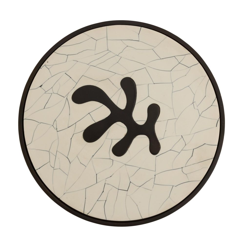 Round ceramic tile with black fish symbol on a beige cracked pattern