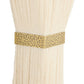 close up of a Beige sconce with gold trim on a white background