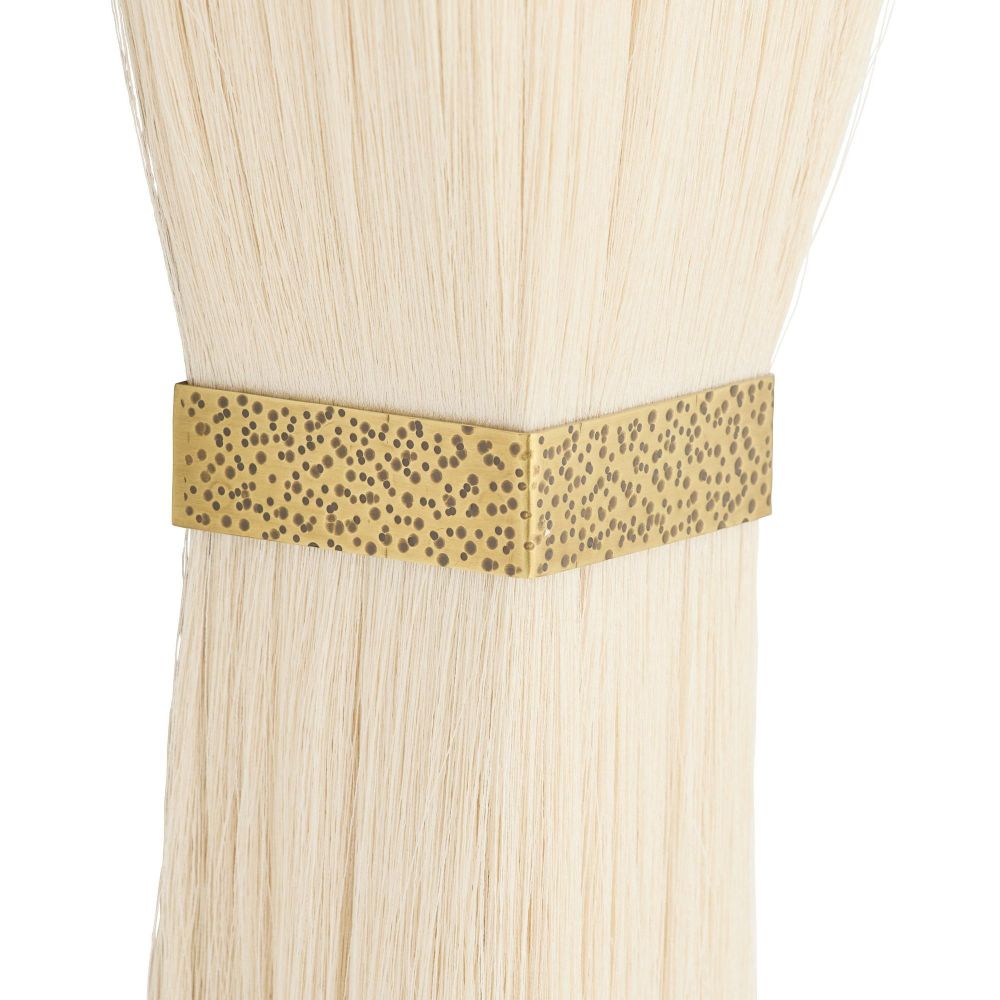 close up of a Beige sconce with gold trim on a white background