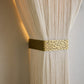 Beige sconce with gold trim 
