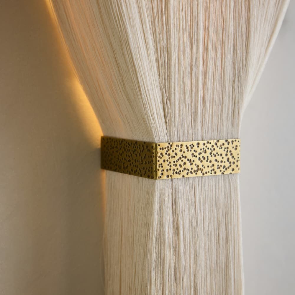 Beige sconce with gold trim 