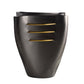 Black vase with gold accents on a white background