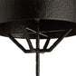 Close-up of a black metal lamp with a textured shade on a white background
