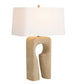 Table lamp with a beige stone base and white shade on a white background