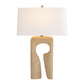 Table lamp with a beige stone-like base and white shade on a white background