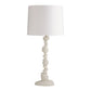 White table lamp with a white shade on a white background