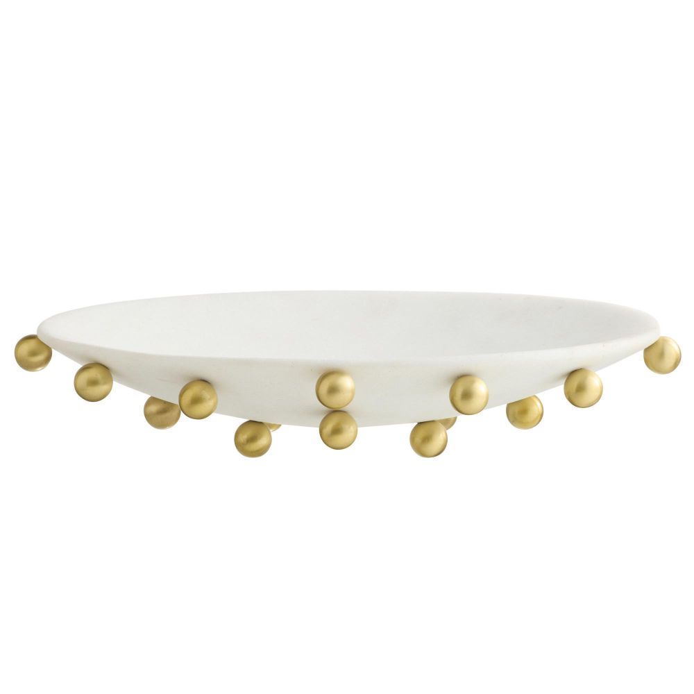 White dish with gold embellishments on a white background