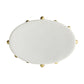 Round white light fixture with gold accents on a white background