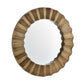 Round mirror with a decorative gold frame on a white background
