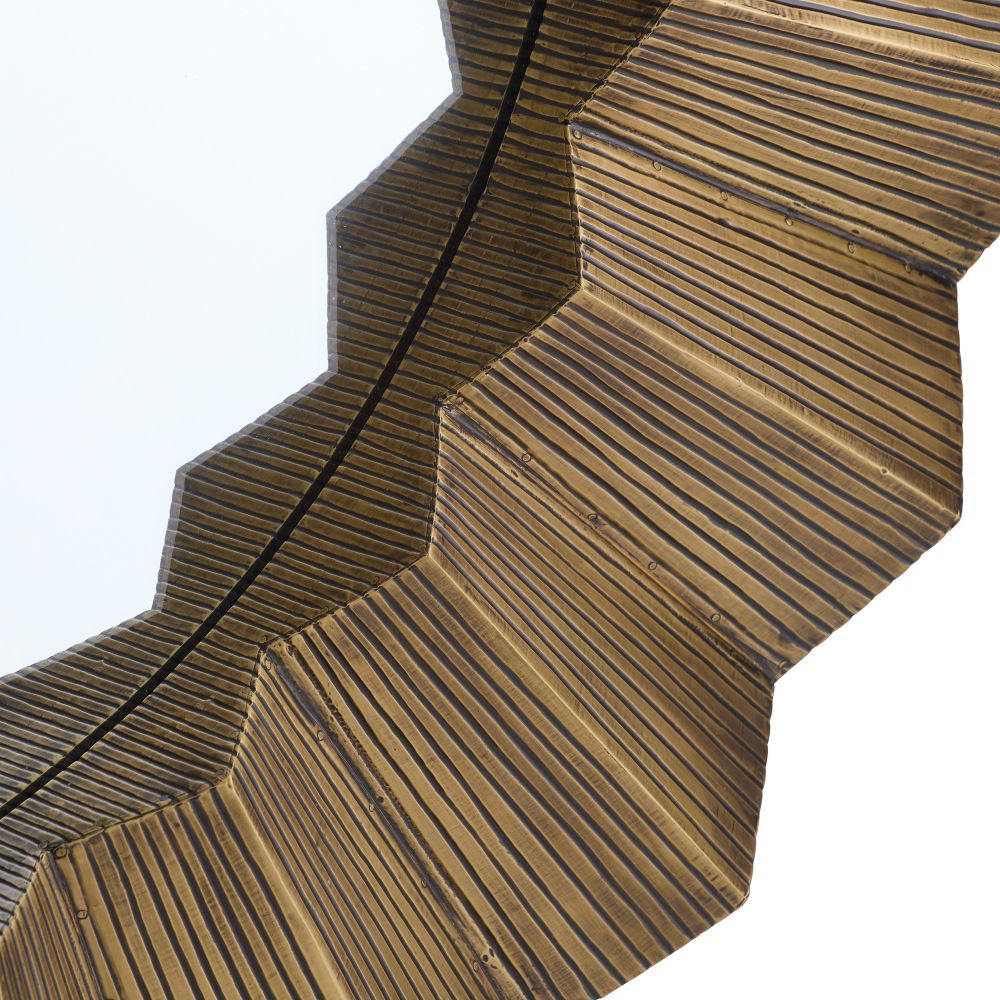 Close-up of a textured brown object with geometric design on a white background