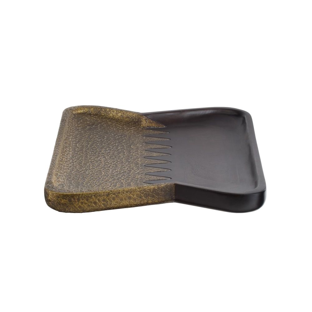 Pet grooming tool with a textured surface and comb on a white background