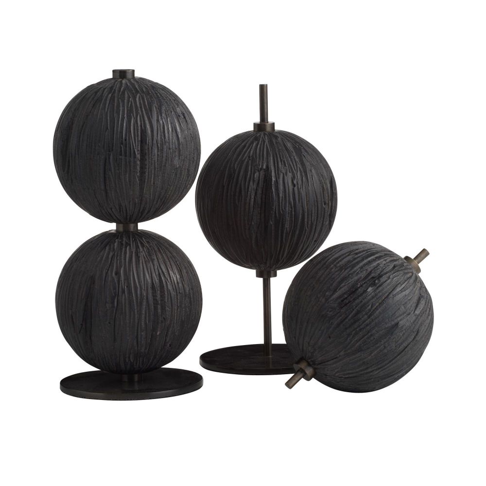 Set of black spherical decorative items on a white background