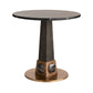 Round table with marble top and bronze base on a white background