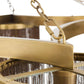 Close-up of a brass chandelier with intricate design