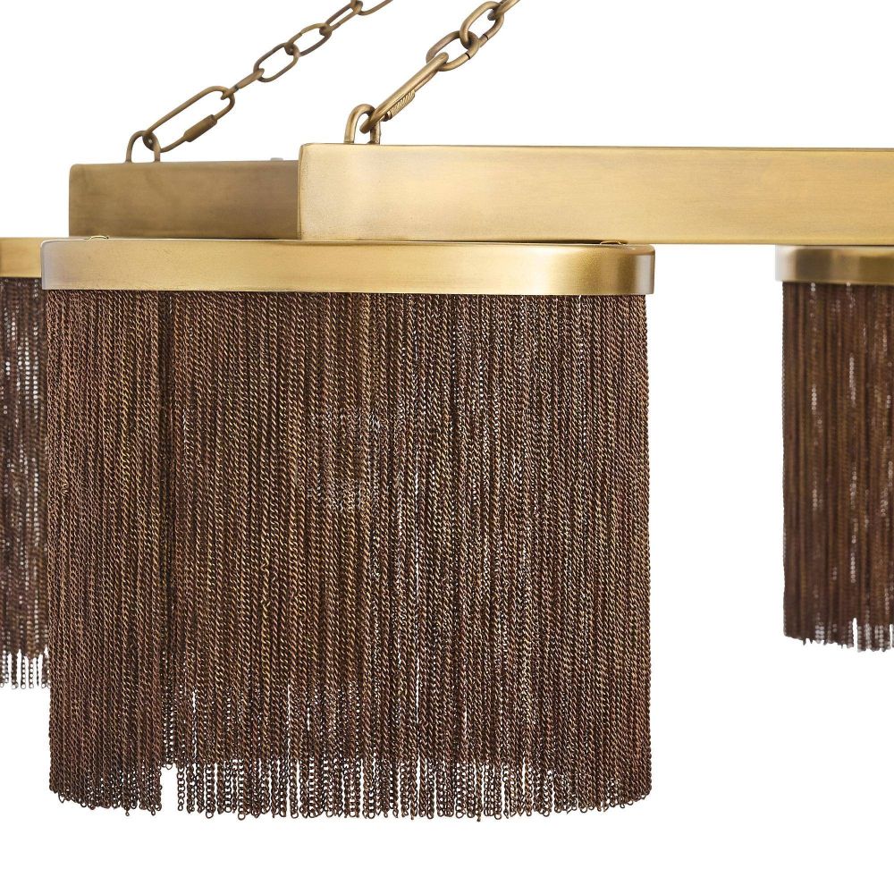 Gold chandelier with brown fringe on a white background
