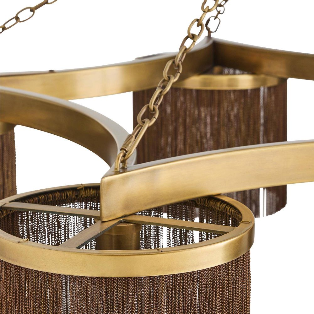 Close-up of a brass chandelier with brown textured shades on a white background