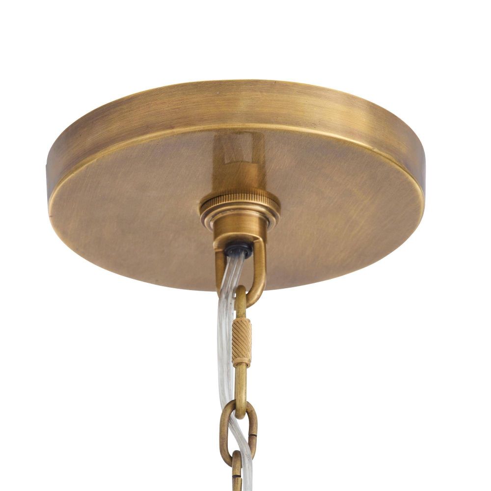 Brass ceiling light fixture on a white background