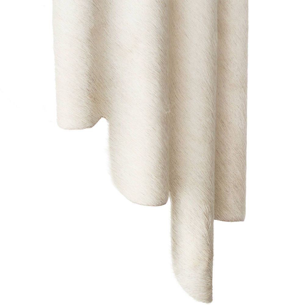 Close-up of a textured white sconce on a white background