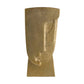brass sculpture of a face on a white background