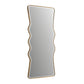 Wavy-shaped mirror with gold frame on a white background