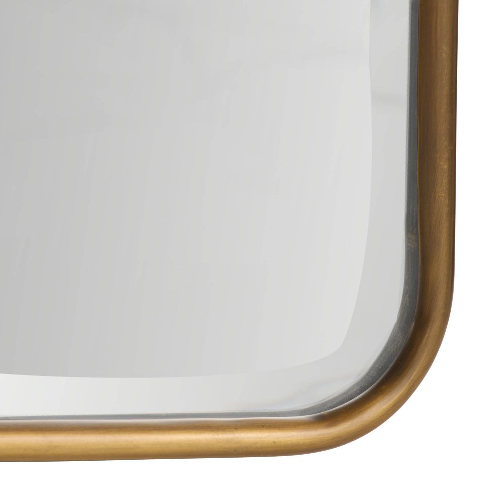 Rectangular mirror with a gold frame on a white background