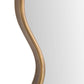 Gold-framed mirror on a white background
